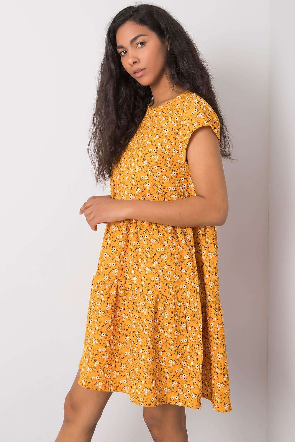 Elegant loose-fitting daydress by Stitch&Soul showcased in a flattering pose, highlighting its beautiful floral design and comfortable cut, ideal for casual elegance.
