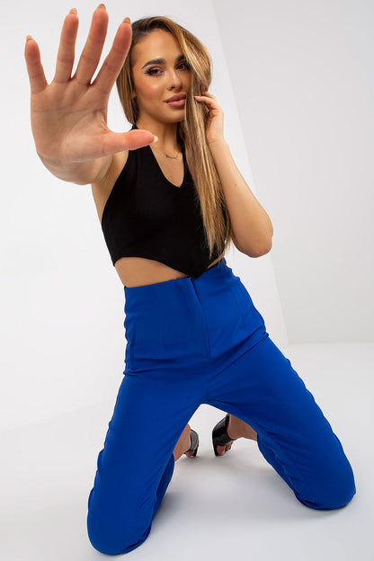 Stunning model showcasing Xsapienza Women’s High-Waisted Straight Cut Trousers with Imitation Pockets, perfect for styling, wearing a stylish black top.