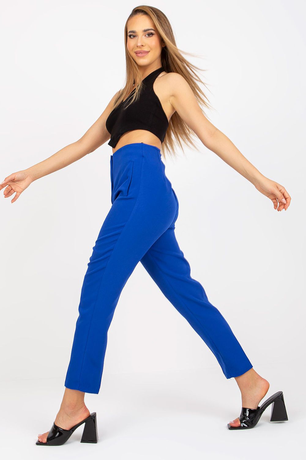 Elegant model in Xsapienza Women’s High-Waisted Straight Cut Trousers with Imitation Pockets, perfect for styling, confidently walking in a chic black top.