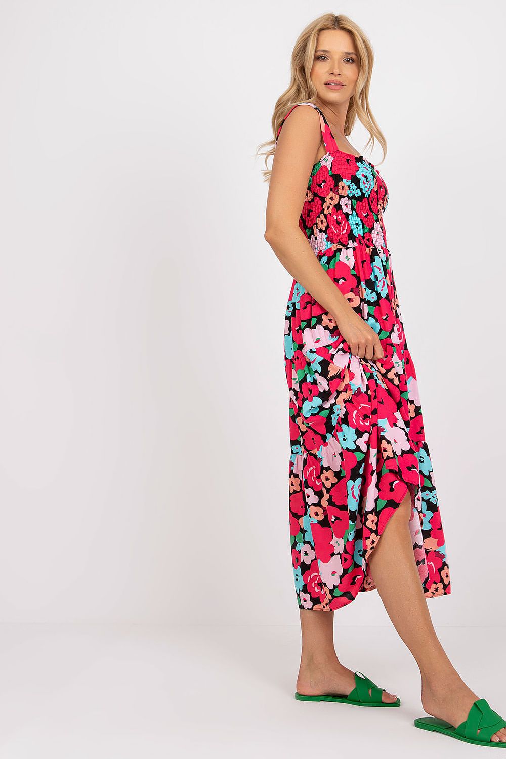 Side view of the Floral Summer Dress by Rue Paris showcasing wide straps and a luxurious flared frill design, perfect for summer occasions with its striking floral motif.
