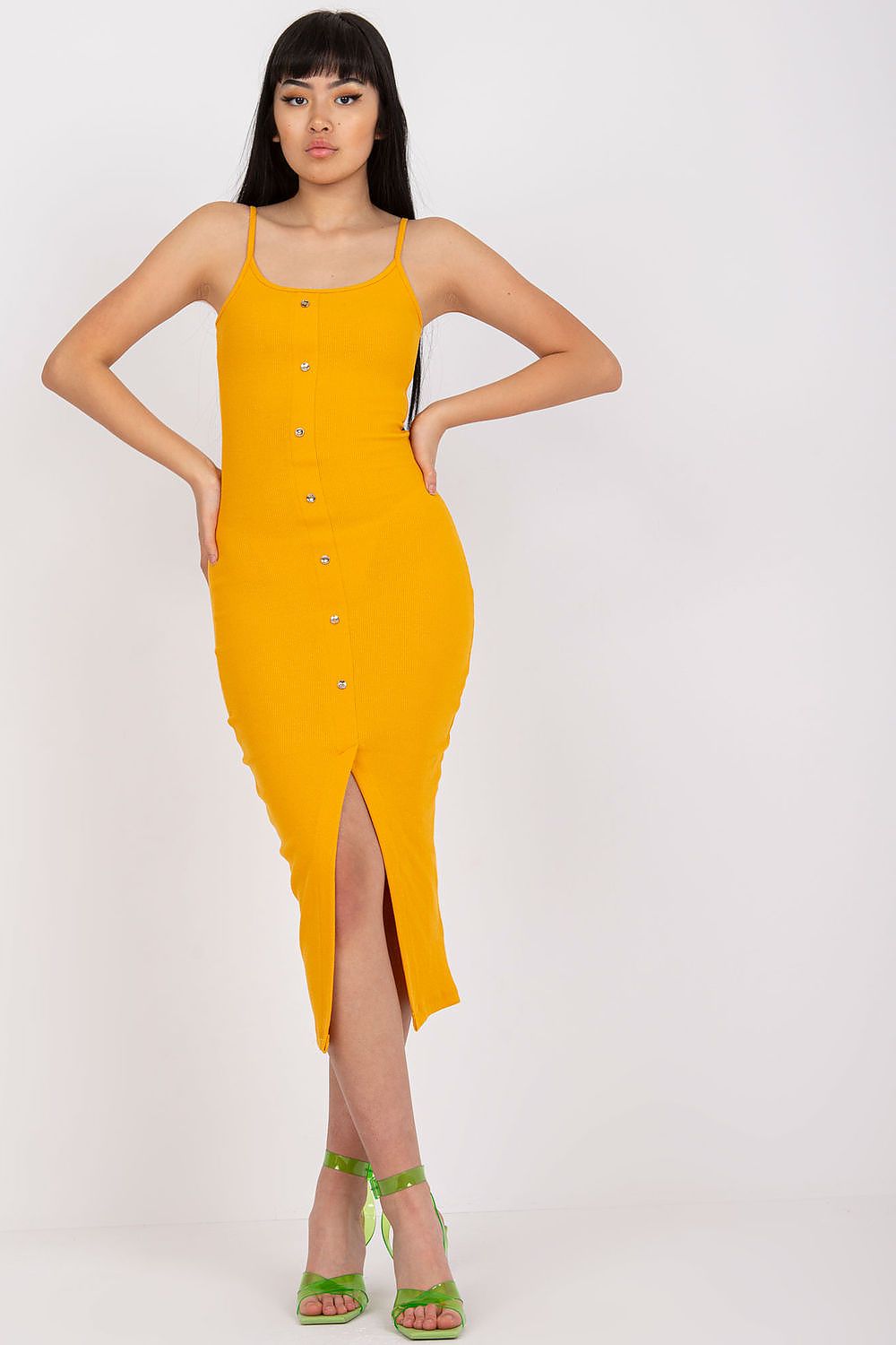 Stylish Elegant Ribbed Summer Dress With Straps And Decorative Buttons By Rue Paris, model showcasing a vibrant yellow dress with a pencil cut ideal for summer, designed for EU sizes S to L.