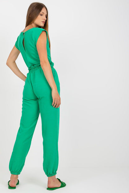 Back view of the Elegant Rue Paris Summer Set in green, showcasing the chic blouse and elasticated waistband of the long pants.