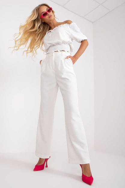 Luxurious Wide Leg Women’s Trousers by Rue Paris showcased with a stylish white off-shoulder blouse, featuring chic pink sunglasses and vibrant pink heels, perfect for a fashionable summer look.