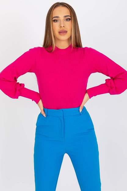 Elegant Long Sleeve Ribbed Blouse by Rue Paris, featuring a vibrant pink colour, worn with tailored blue trousers, showcasing luxurious cotton and spandex fabric.