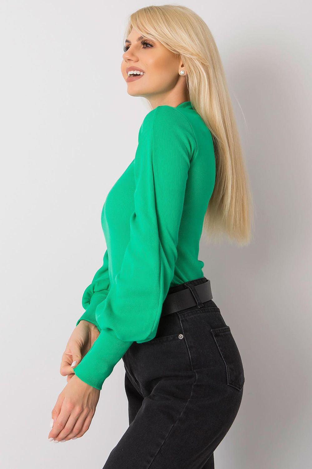 Side view of the Elegant Long Sleeve Ribbed Blouse by Rue Paris in enchanting green, showcasing its structured design, wide ribbed cuffs, and luxurious fabric blend of cotton and spandex.