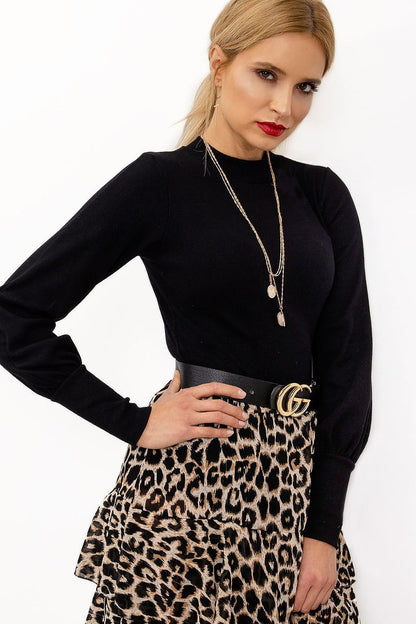 Elegant Long Sleeve Ribbed Blouse by Rue Paris in classic black, paired with a leopard print skirt and layered necklaces, perfect for a fashionable statement.