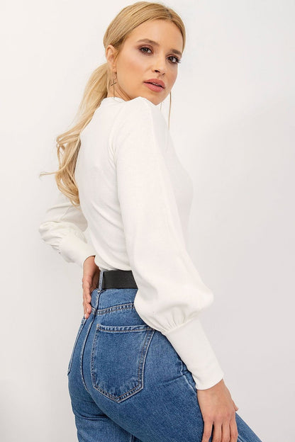 Elegant Long Sleeve Ribbed Blouse by Rue Paris in white, gracefully worn with high-waisted denim, featuring exquisite ribbed detailing and luxurious fabric blend.