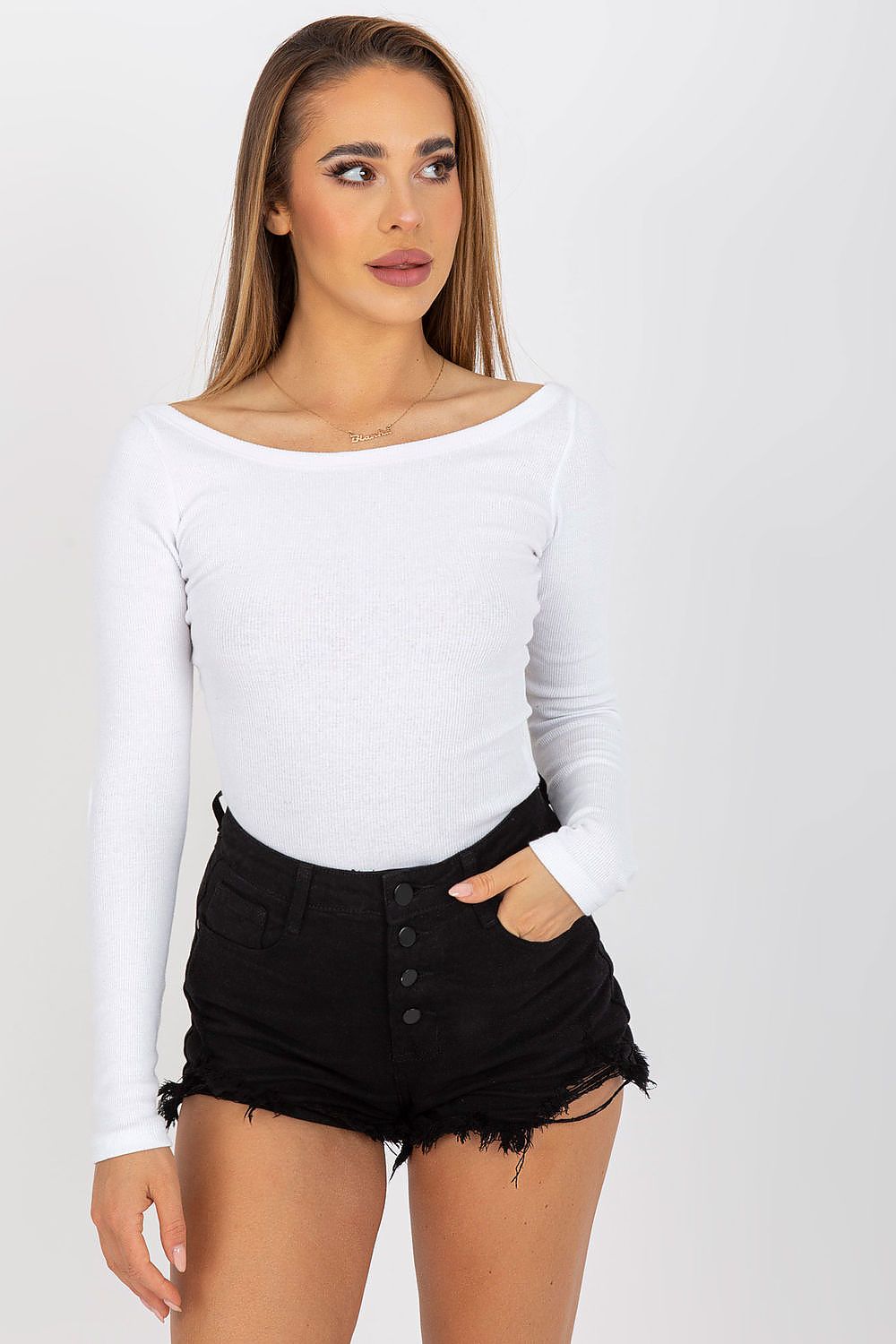 Elegant Long Sleeve Blouse with Boat Neckline and Decorative Slits by Rue Paris, featuring a stylish model wearing the blouse with black high-waisted shorts, showcasing sophistication and comfort.
