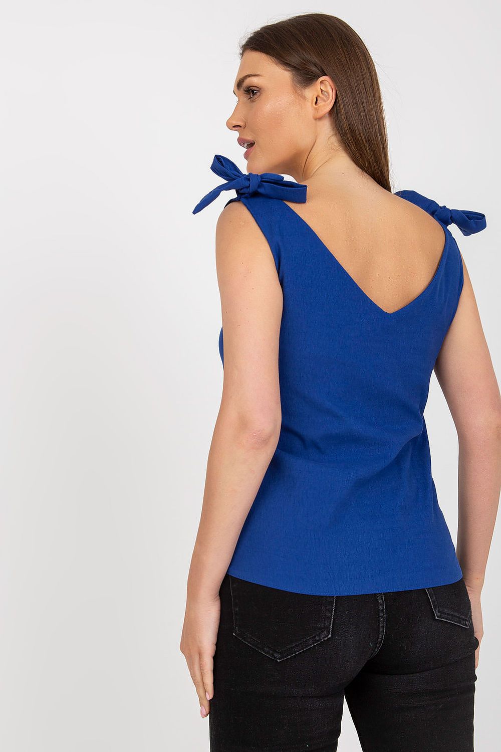 Elegant Rue Paris Top with Heart Neckline and Decorative Ties, highlighting the back view of the top on a model, designed for sophistication.
