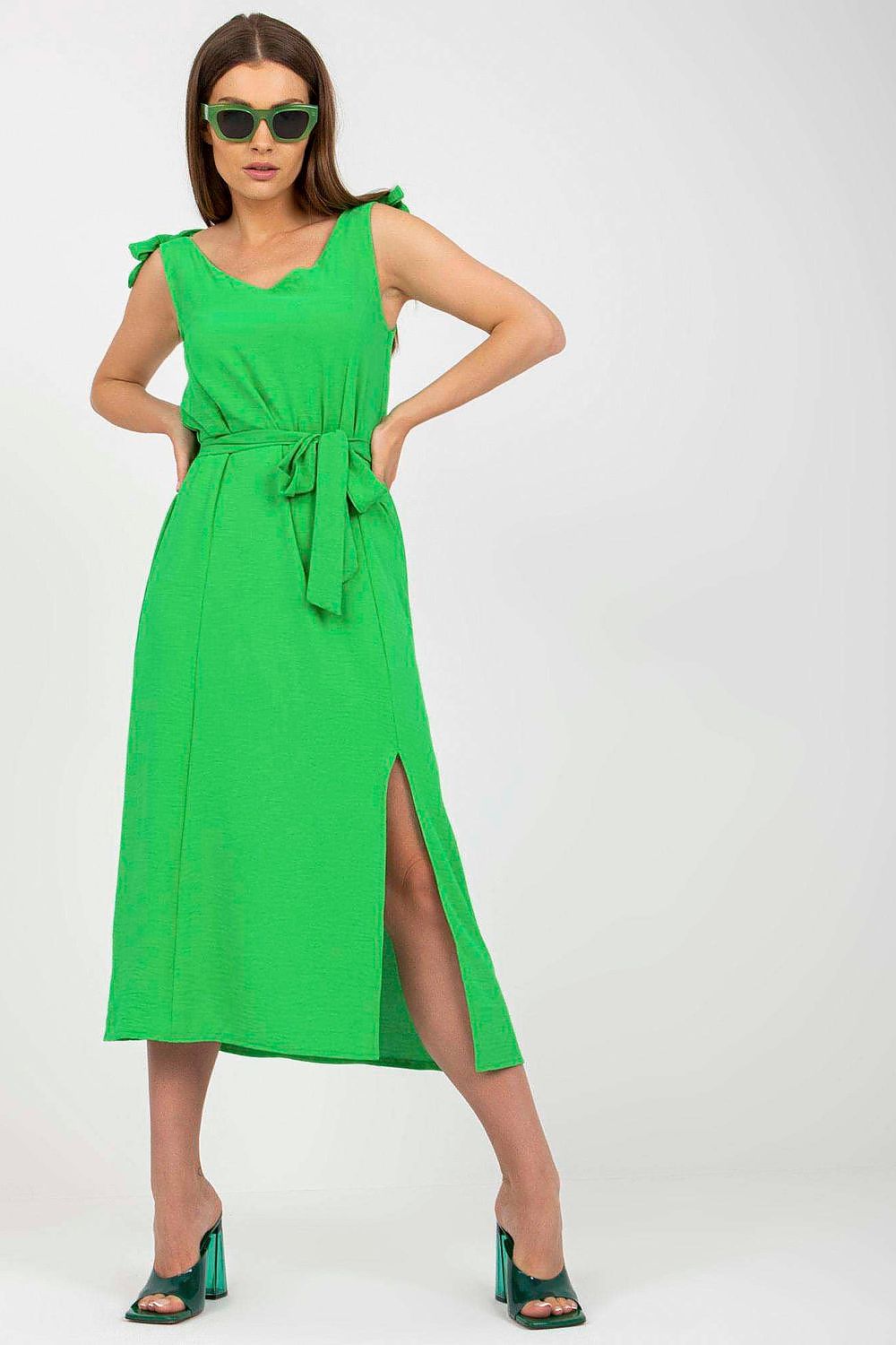 Elegant Summer Dress with Tied Straps and Slit by Rue Paris, model showcasing a vibrant green dress with stylish tied straps and a front slit, perfect for summer occasions.