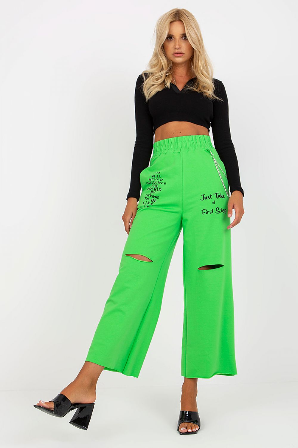 Model flaunting Luxury Women's Wide Leg Sweatpants with Pockets, Elastic Waistband and Decorative Slits, in striking green, featuring stylish slits and chain detailing.