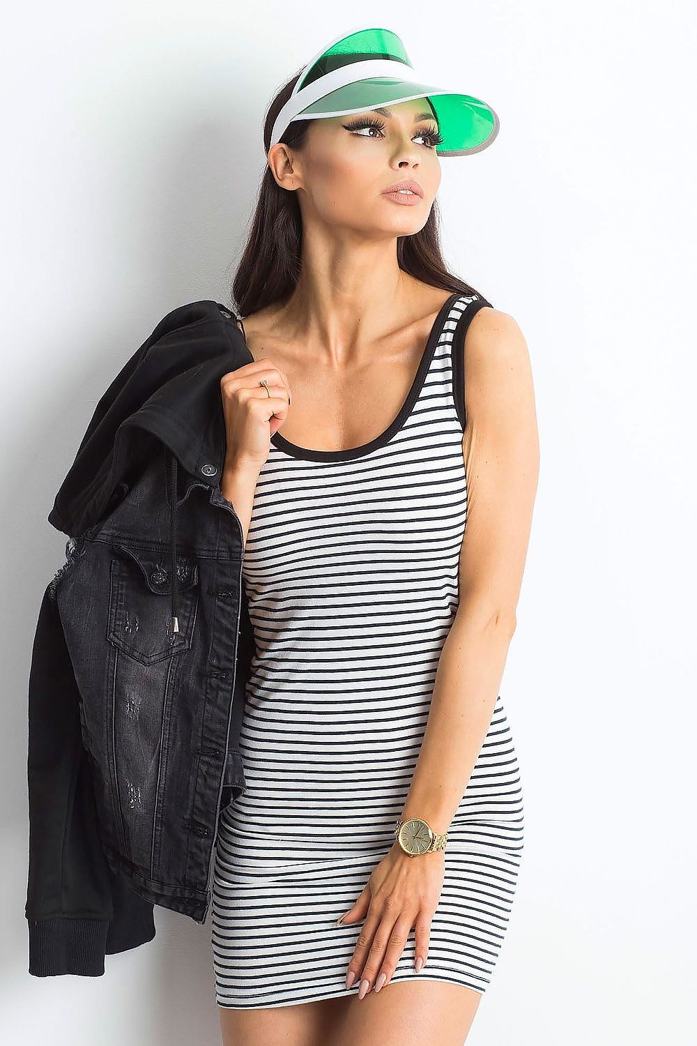 Elegant Summer Strapless Striped Mini Dress by Yups, showcasing a stylish model wearing the dress with a black denim jacket and green visor, perfect for any summer occasion.