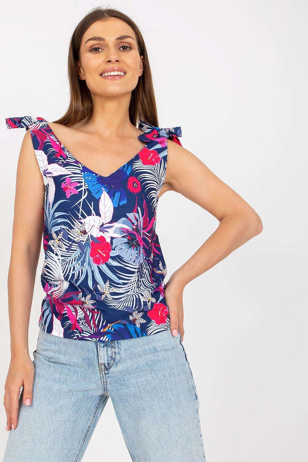 Elegant Heart Neckline Top with Decorative Ties in 100% Polyester by Rue Paris, model poses confidently, highlighting the elegant design and vibrant floral theme.