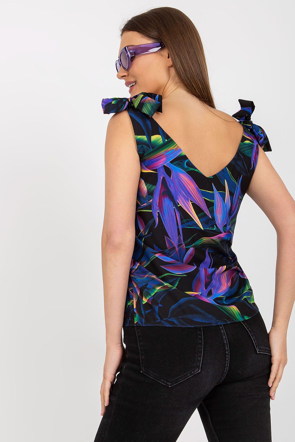 Elegant Heart Neckline Top with Decorative Ties in 100% Polyester by Rue Paris, featuring an eye-catching tropical pattern, model showcasing a chic back view.