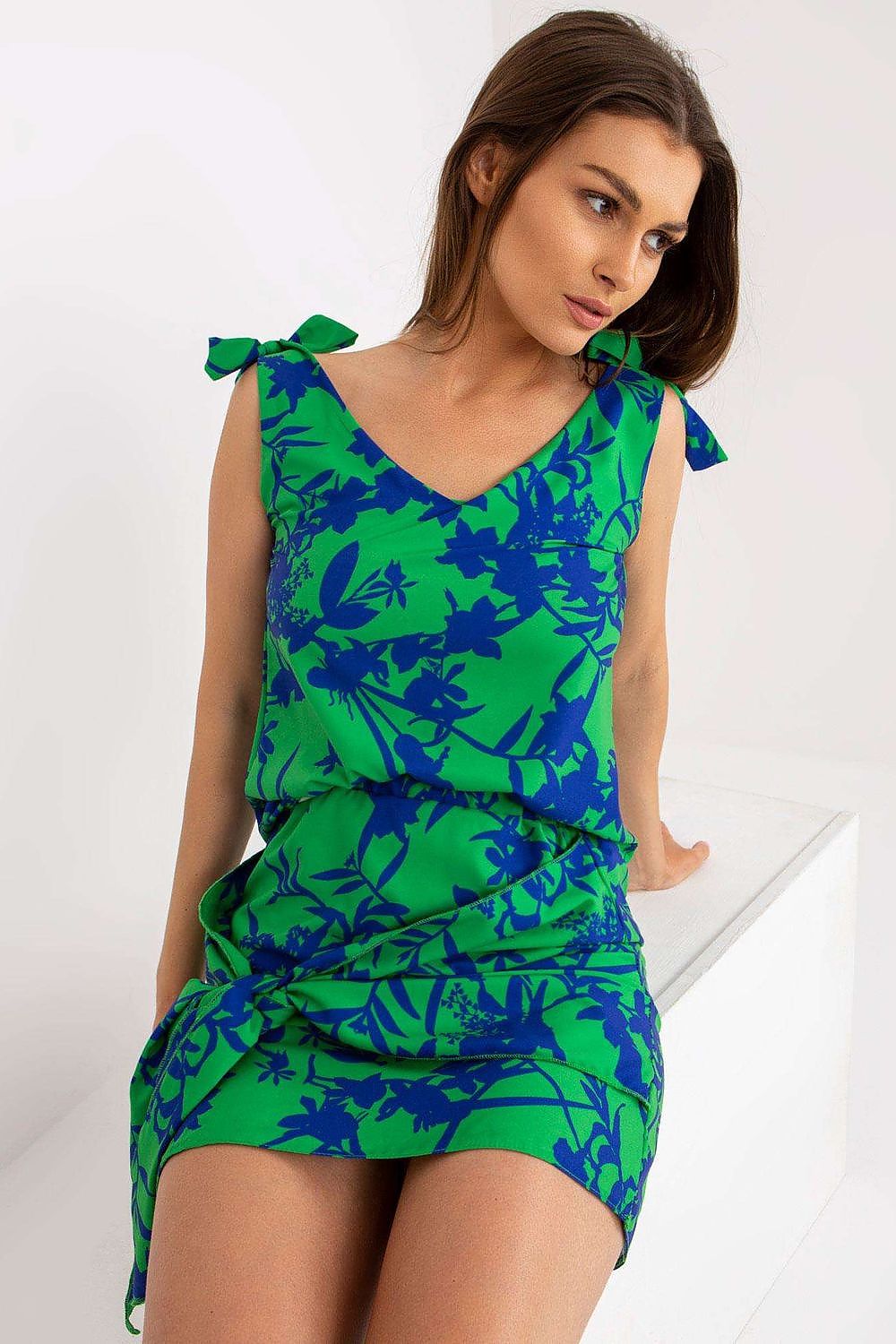 Elegant Heart Neckline Top with Decorative Ties in 100% Polyester by Rue Paris, featured in a stunning blue and green floral print, accompanied by elegant shoulder ties.