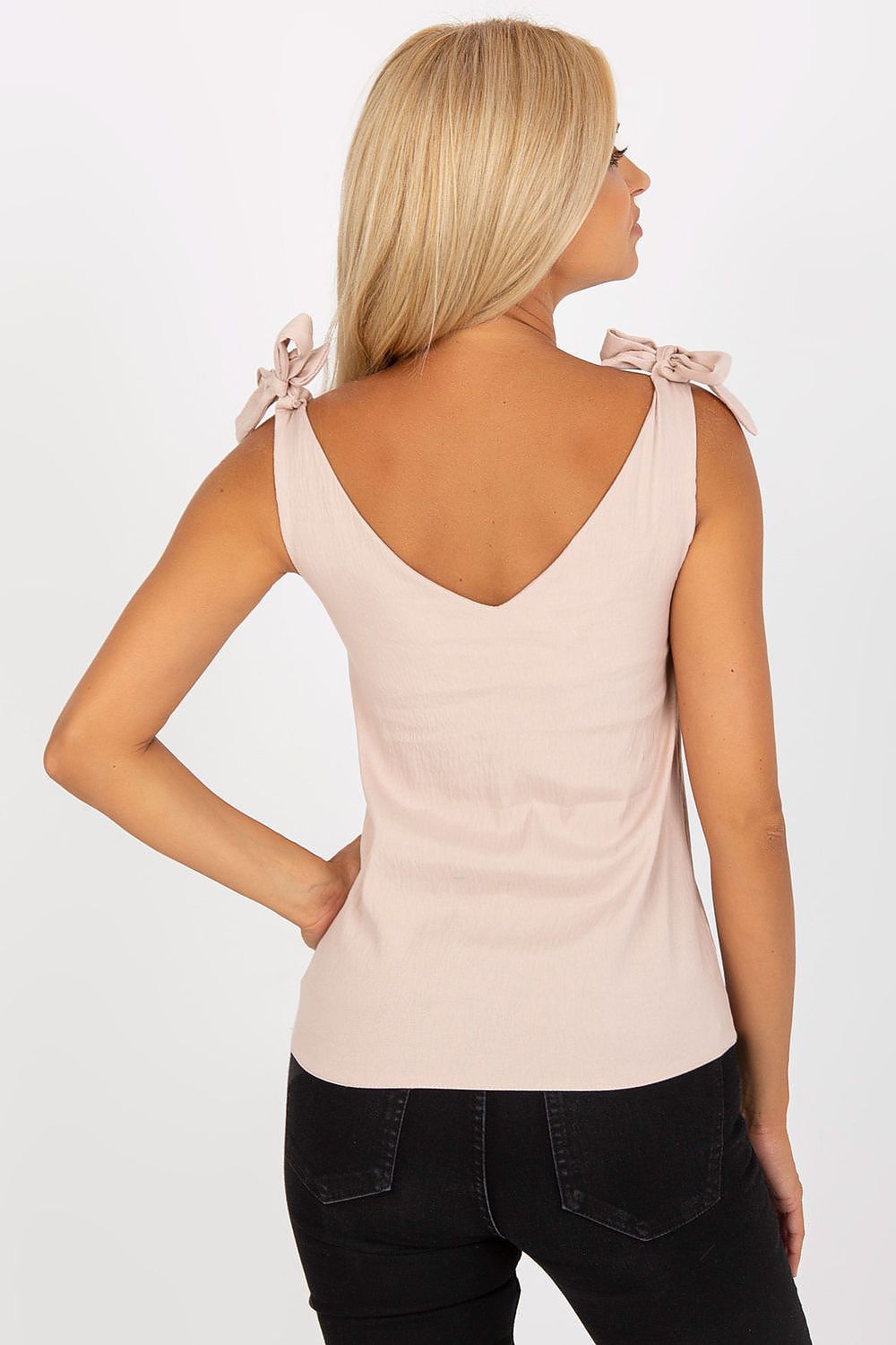 Rear view of the luxurious Rue Paris top with heart neckline and decorative ties, highlighting its elegant silhouette and sophisticated design.