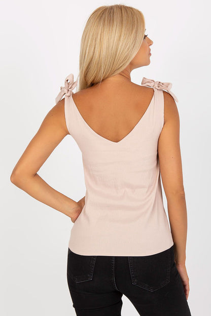 Rear view of the luxurious Rue Paris top with heart neckline and decorative ties, highlighting its elegant silhouette and sophisticated design.