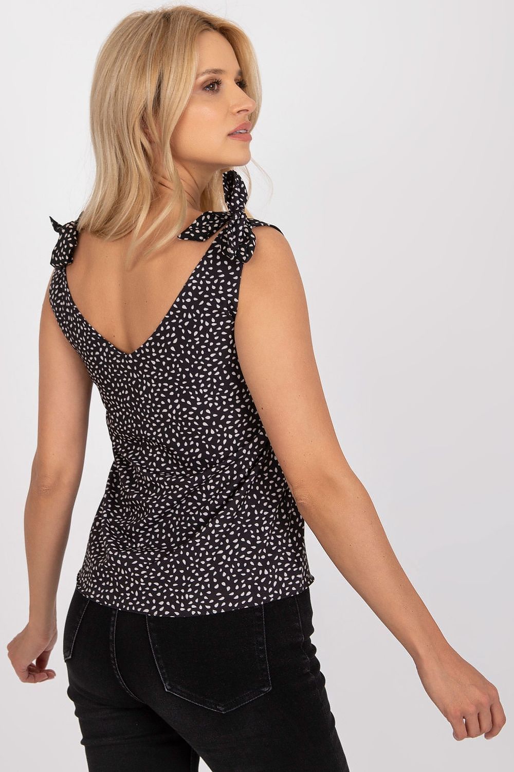 Elegant Heart Neckline Top with Decorative Tie Straps by Rue Paris, displayed on a model, showcasing the chic back view with a flattering silhouette.