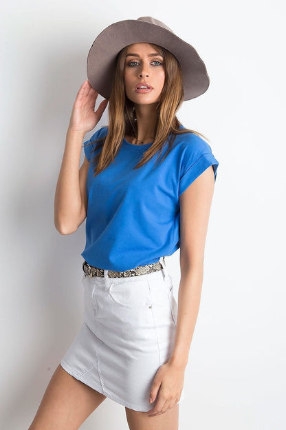Women's Luxurious BFG Cotton Spandex T-Shirt - Short Sleeve Round Neckline, Perfect Fit, worn with a trendy white skirt and a stylish hat, offering a perfect blend of sophistication and comfort.