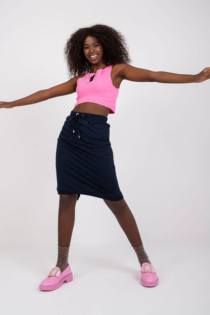Luxury Sweatshirt Skirt By BFG in navy blue, elegantly styled with a pink crop top and playful accessories, showcasing comfort and style.