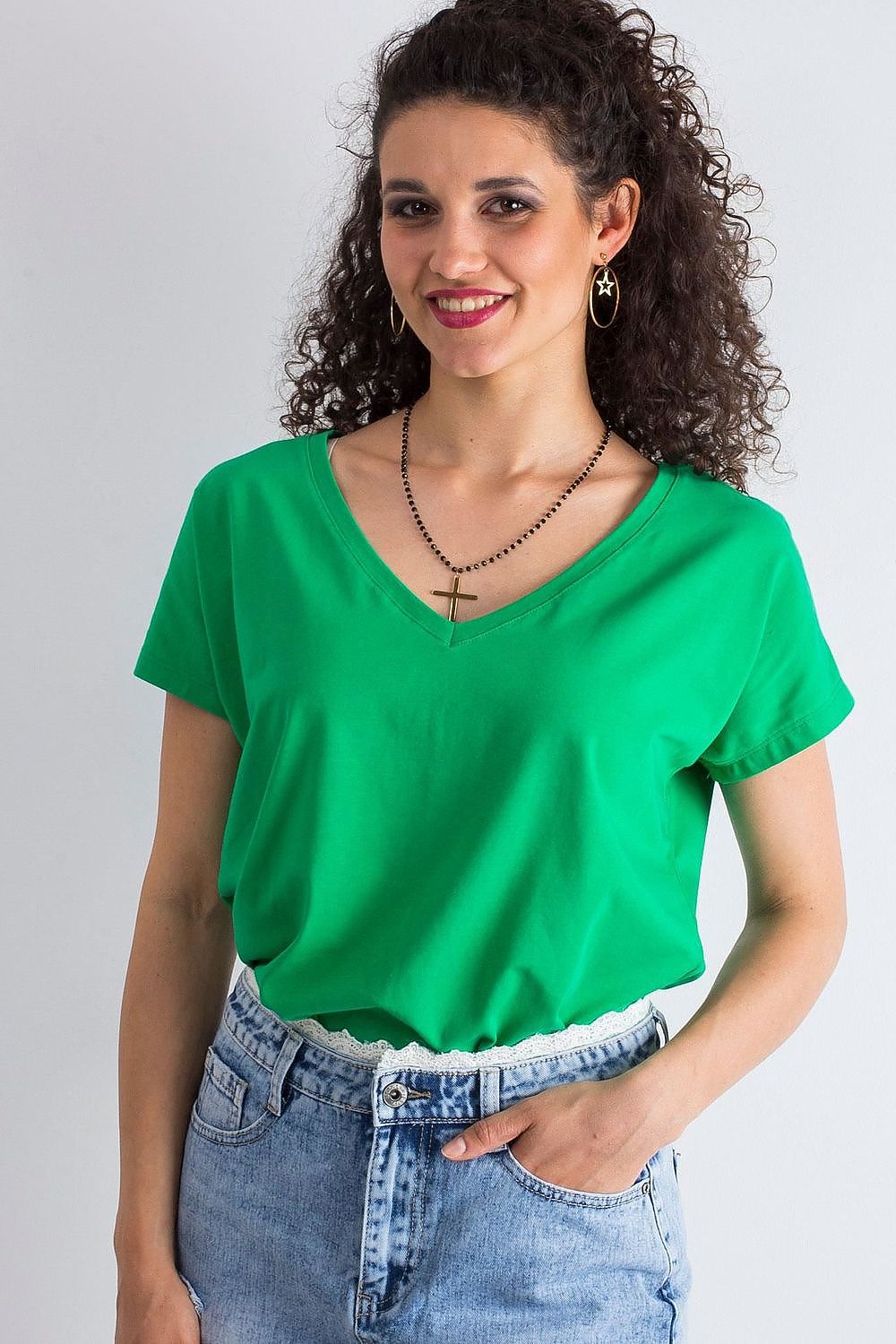 Elegant Women's Short Sleeve T-Shirt with Heart Neckline in vibrant green, showcasing a casual style paired gracefully with denim shorts, perfect for versatile occasions.