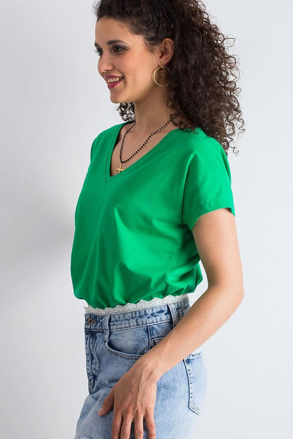 Elegant Women's Short Sleeve T-Shirt with Heart Neckline in green, elegantly cut with a fashionable vibe, perfectly complemented by vintage denim.