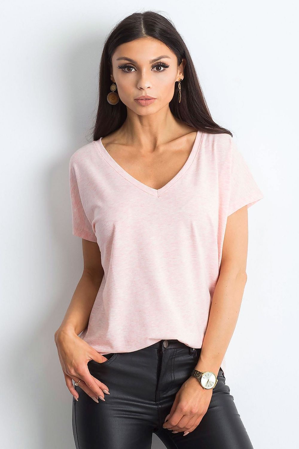 Elegant Women's Short Sleeve T-Shirt with Heart Neckline in soft pink, exuding luxury and style, paired with sleek black leather trousers.