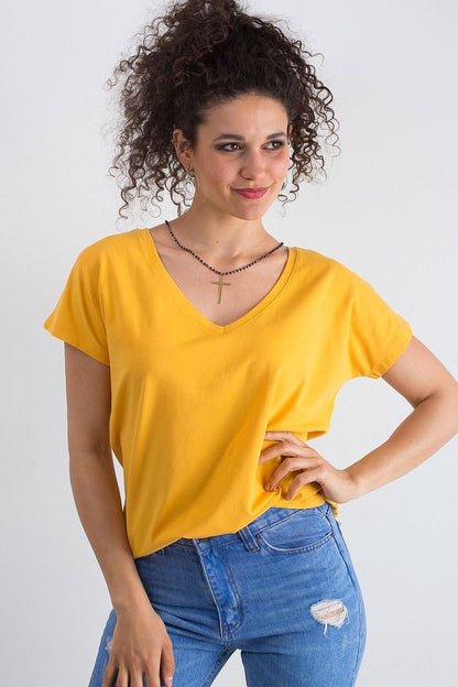 Elegant Women's Short Sleeve T-Shirt with Heart Neckline in vibrant yellow, made from 90% cotton, styled in a casual setting.
