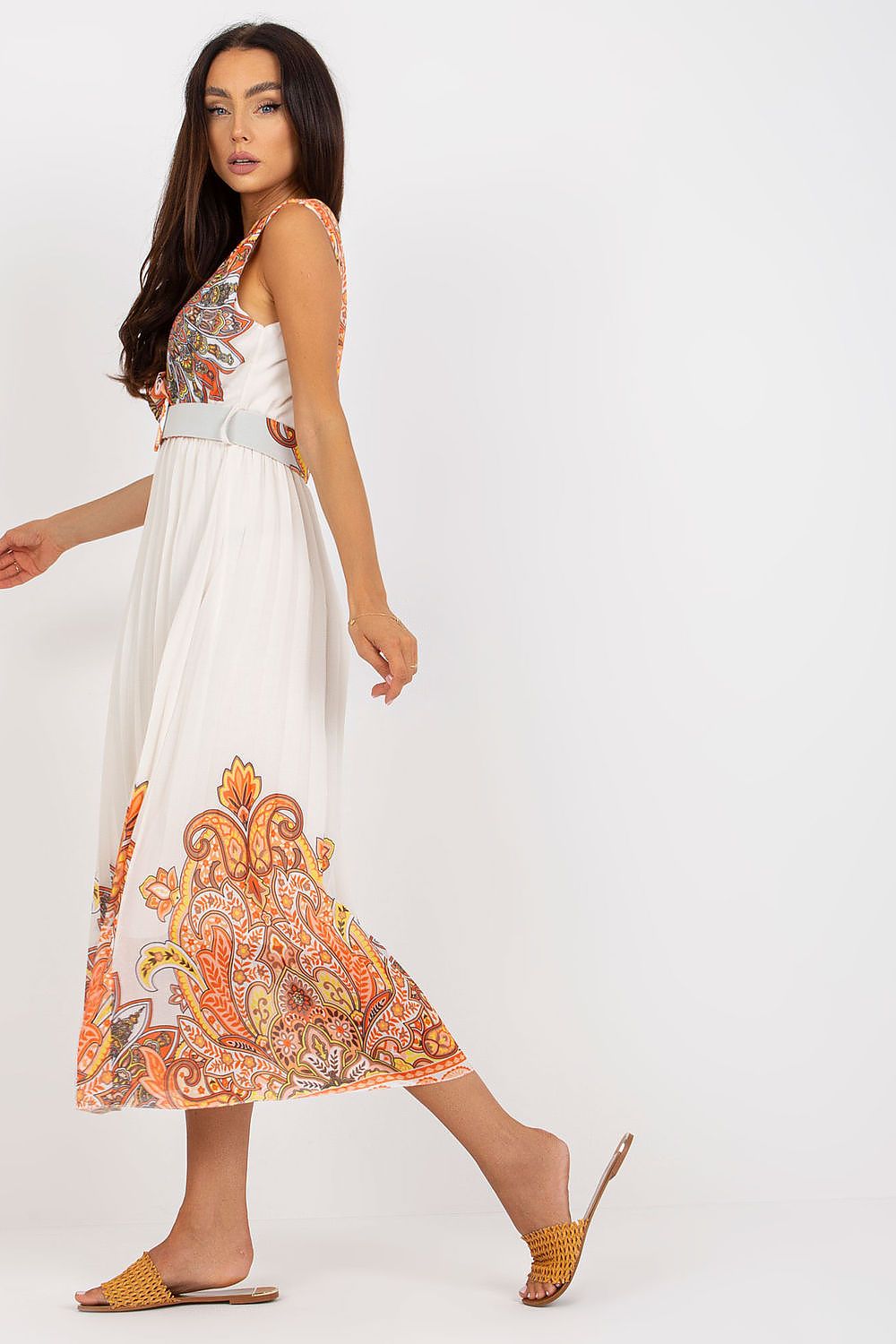 Elegant Summer Flared Sleeveless Dress with Envelope Neckline and Pleated Bottom by Italy Moda, showcasing a side view with a flowing silhouette and intricate design details.