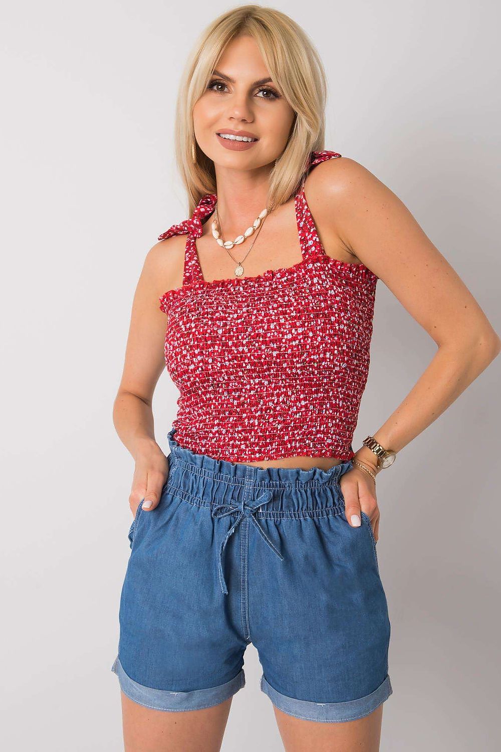 Floral Summer Top with Tied Straps by Rue Paris, combining a lovely red floral fabric with fashionable denim shorts, an ideal ensemble for sophisticated summer wear.