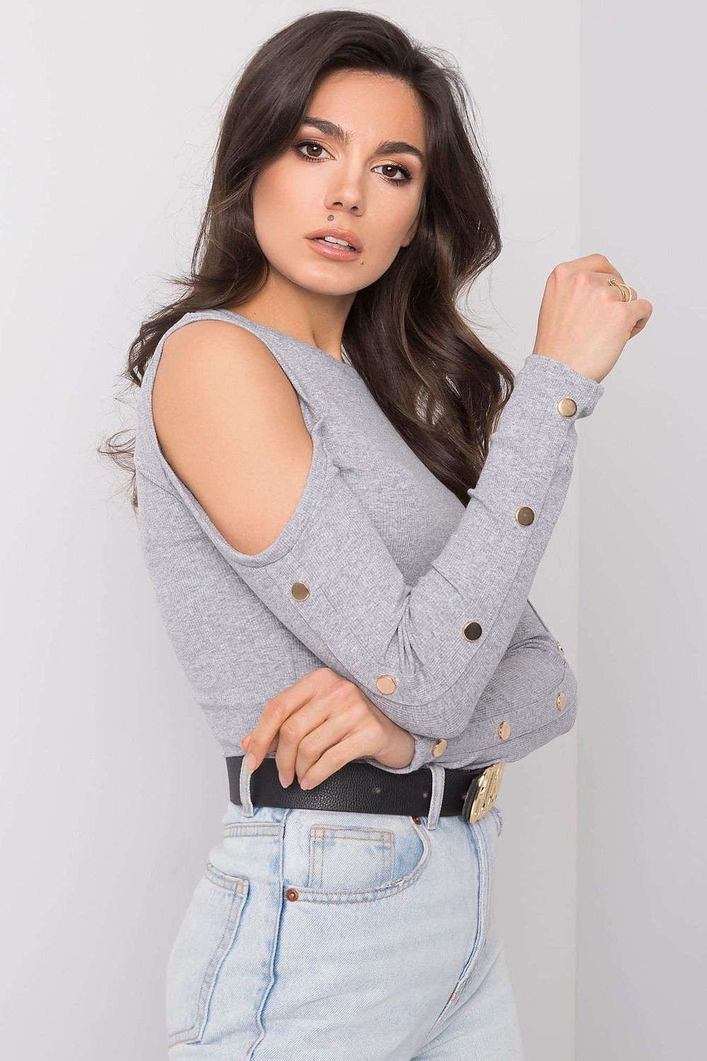 Profile shot of the Elegant Fitted Cotton Blend Blouse with Ribbed Long Sleeves by Rue Paris, featuring unique cut-out shoulders and gold button details.