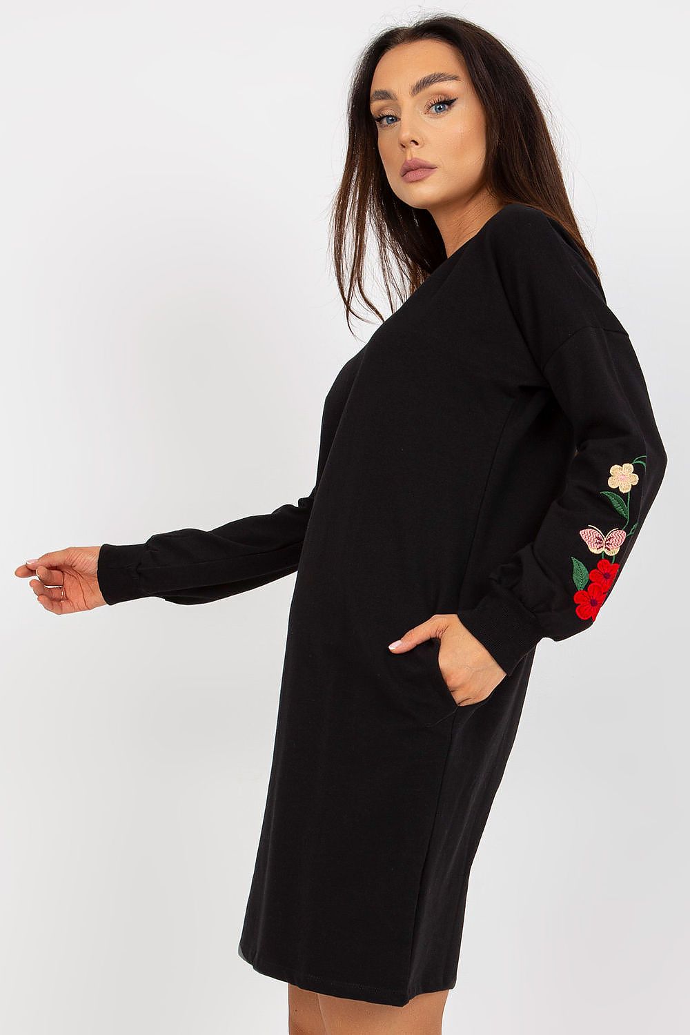 Elegant Cotton Spandex Tracksuit Dress with Embroidered Sleeves and Side Pockets - Rue Paris, highlighting the elegant silhouette and floral embroidery on the sleeves, worn by a model.