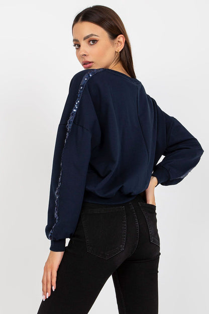 Luxury Rue Paris Women's Sequined Long Sleeve Sweatshirt with Round Neckline - Elegant Comfort, highlighting the stylish back view of a navy sweatshirt adorned with sequins, ideal for a sophisticated look.