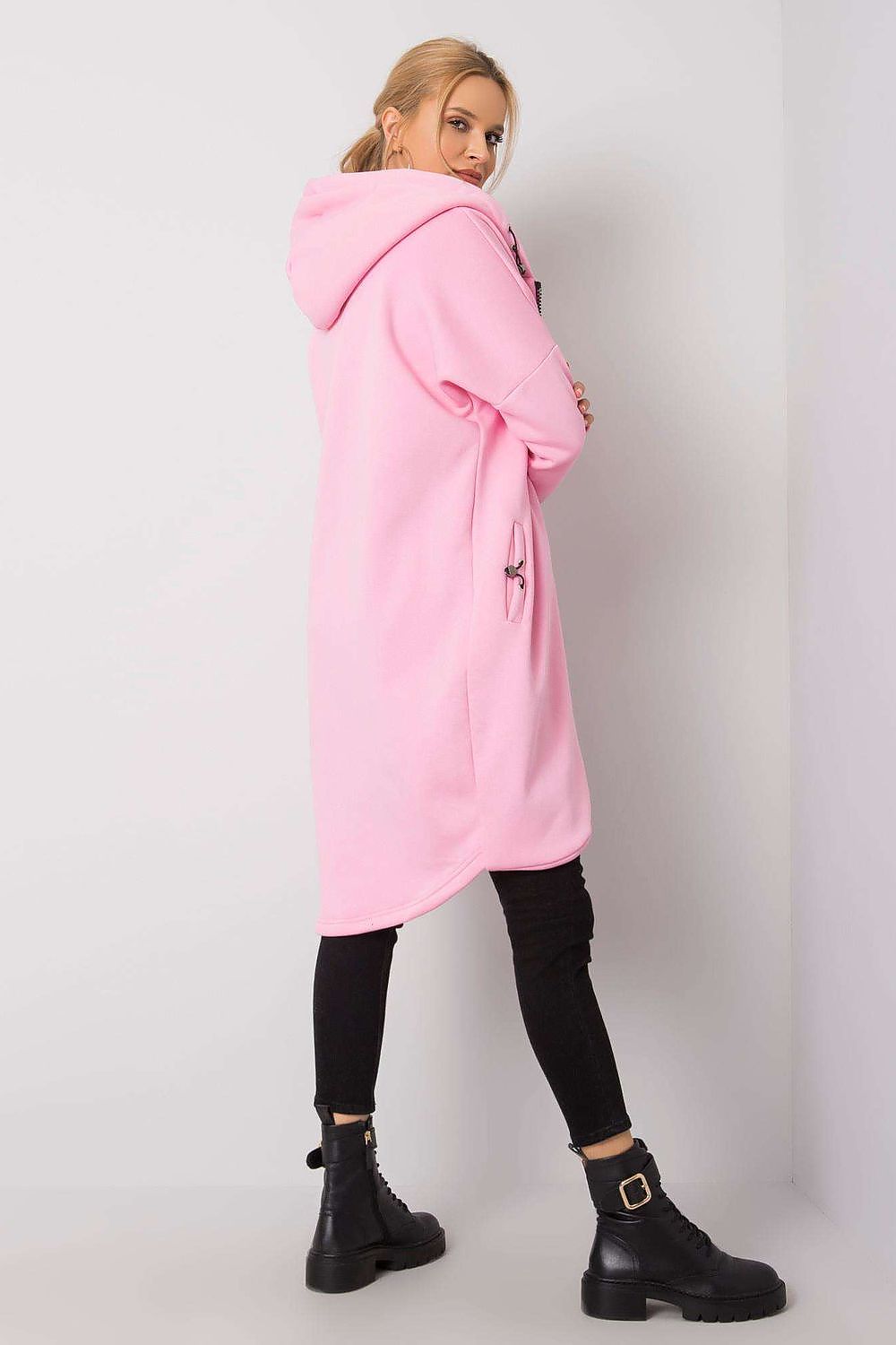 Back view of the Rue Paris Zip-Up Extended Cut Sweatshirt with Hood and Side Pockets in pink, showcasing its luxurious extended cut and stylish hood.
