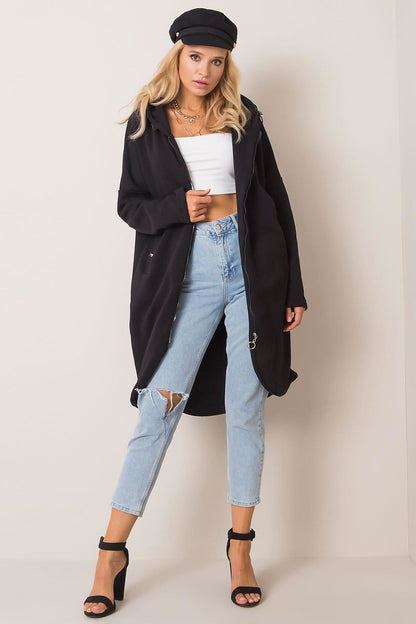 Rue Paris Zip-Up Extended Cut Sweatshirt with Hood and Side Pockets, elegantly portrayed with a model sporting a sophisticated pose in black.