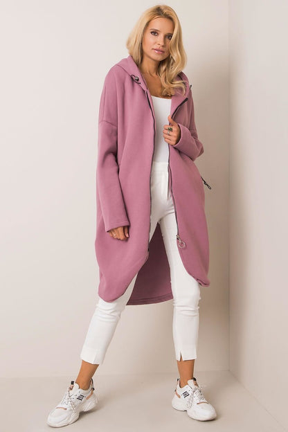 Rue Paris Zip-Up Extended Cut Sweatshirt with Hood and Side Pockets, beautifully modelled in pink, offering a contemporary and fashionable vibe.