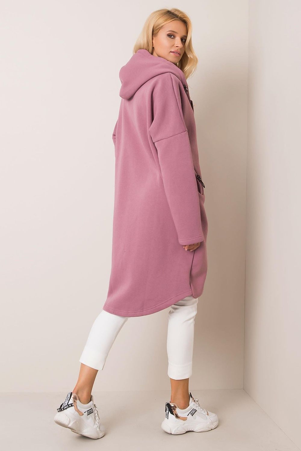 Rue Paris Zip-Up Extended Cut Sweatshirt with Hood and Side Pockets in soft mauve, stylishly worn by a model showcasing its generous length and relaxed fit, perfect for a luxurious casual look.
