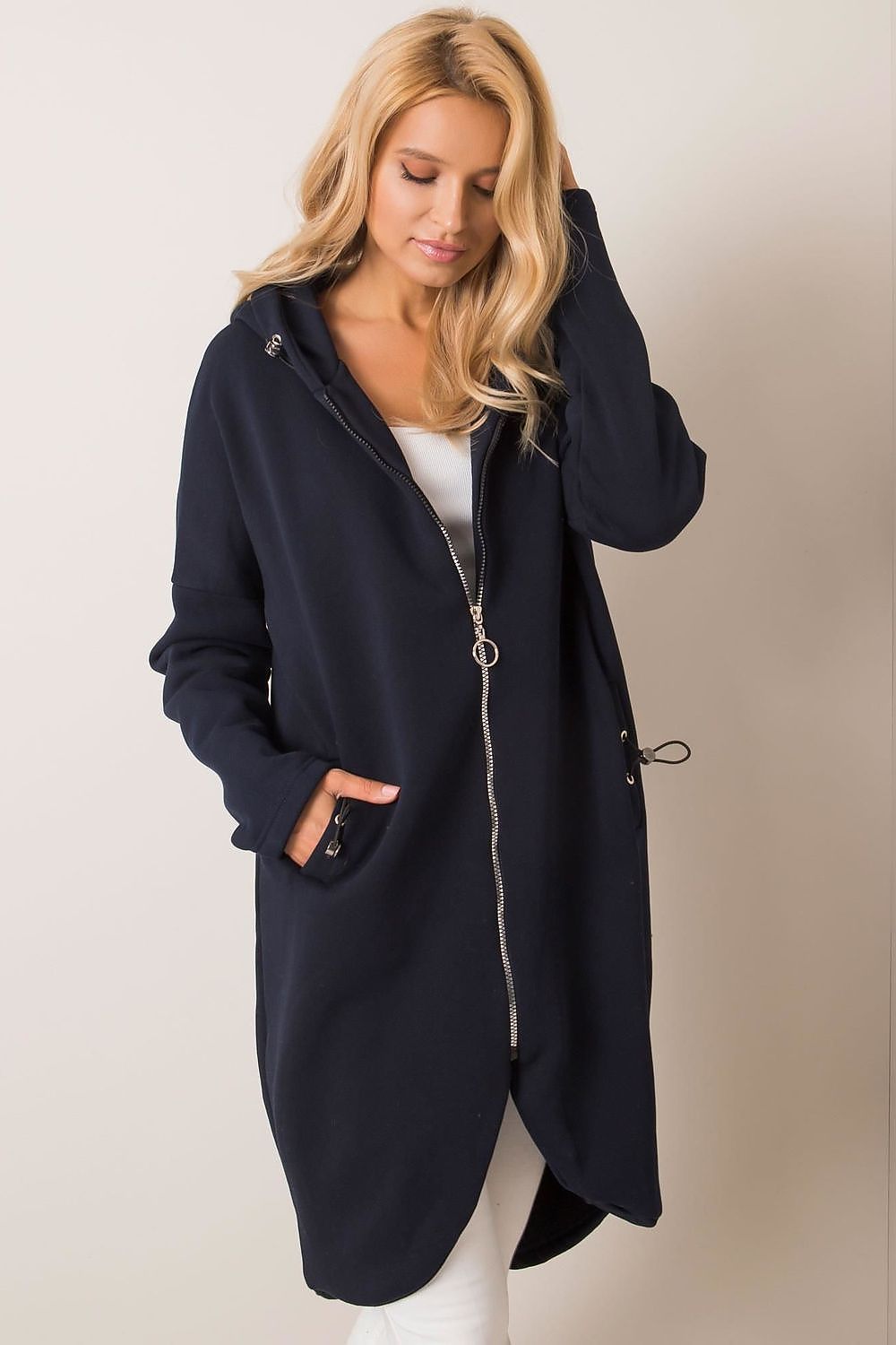 Rue Paris Zip-Up Extended Cut Sweatshirt with Hood and Side Pockets presented in classic navy, elegantly showcased by a model to enhance its chic and versatile style, perfect for high-end casual wear.