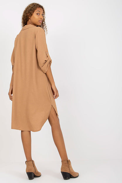 Italy Moda Loose-Fitting V-Neck Shirt Dress with Long Sleeves - Back view of the model in an understated yet elegant shirt dress, accentuating the refined silhouette and luxurious fabric ideal for casual elegance.