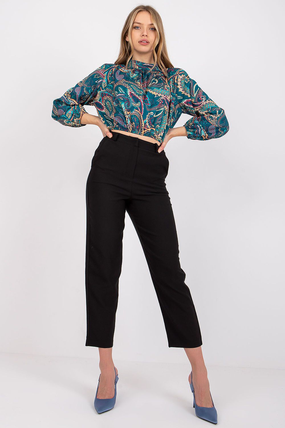 Model showcasing a Luxury Short Blouse with Long Sleeves and Stand-Up Collar by Italy Moda, featuring a vibrant paisley pattern paired with elegant black trousers for a chic look.