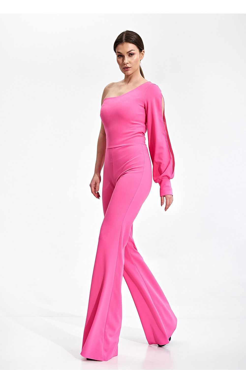 Elegant Figl Jumpsuit With Long Sleeve, Slit Cuff & Wide Legs - A model showcasing a fitted pink jumpsuit with one long sleeve and slit cuff, designed for a luxurious look, perfect for any occasion.