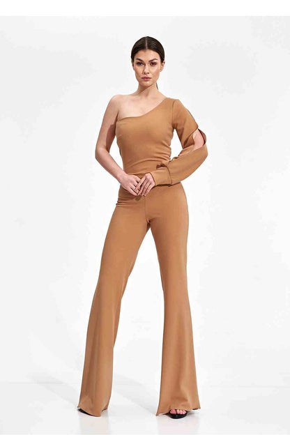 Elegant Figl Jumpsuit With Long Sleeve, Slit Cuff & Wide Legs - A model presenting a sophisticated brown jumpsuit featuring one long sleeve and decorative slit cuffs, ideal for luxurious occasions.