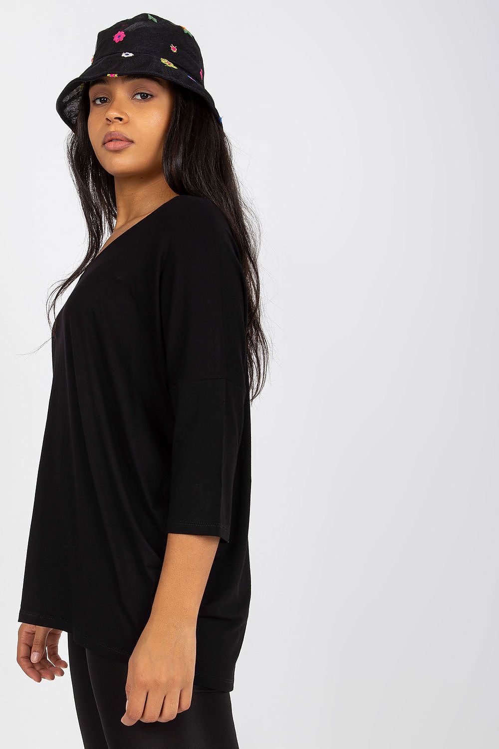 Elegant Plus Size Blouse With 3/4 Sleeves And Sweetheart Neckline, highlighting the model's side profile in a black blouse, designed for contemporary luxury.