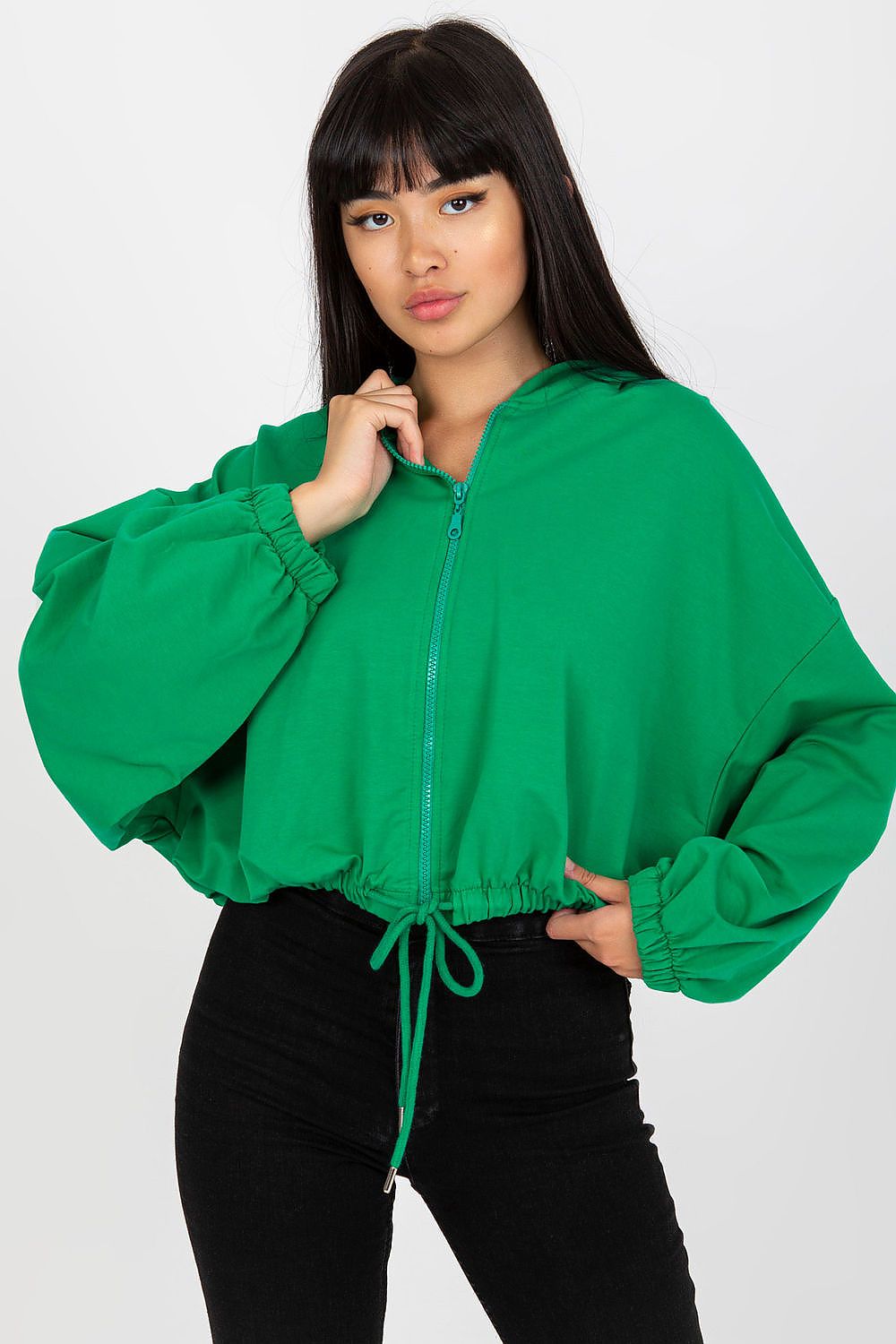 Luxury Women’s Hooded Zippered Sweatshirt by Rue Paris, displayed in a stylish green shade, highlighted with high-waisted black jeans for a chic ensemble.