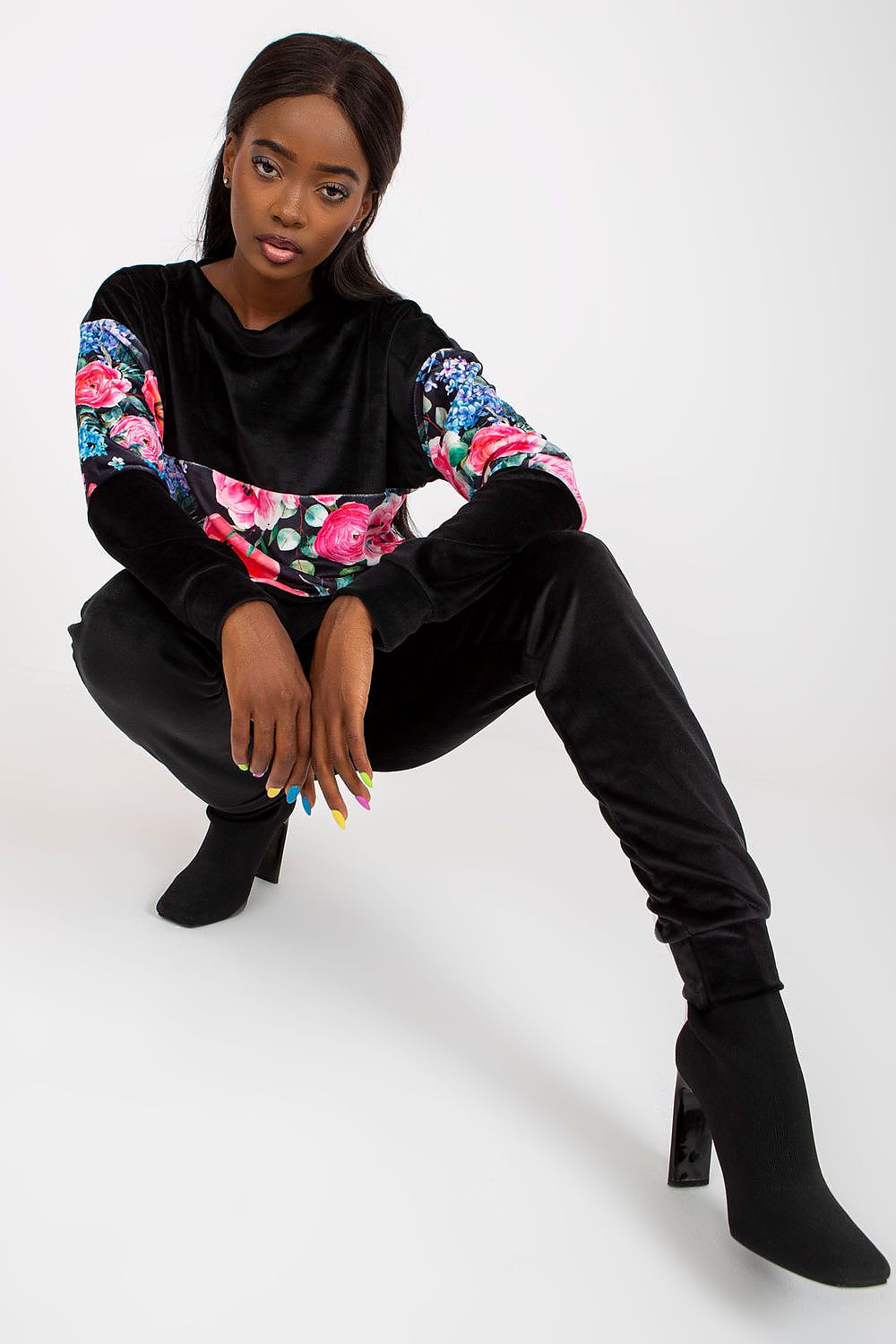 Striking image of the Chic Rue Paris 2-Piece Set with a luxurious black floral sweatshirt and tailored long pants, designed for chic and comfortable styling.