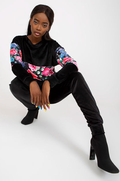 Striking image of the Chic Rue Paris 2-Piece Set with a luxurious black floral sweatshirt and tailored long pants, designed for chic and comfortable styling.