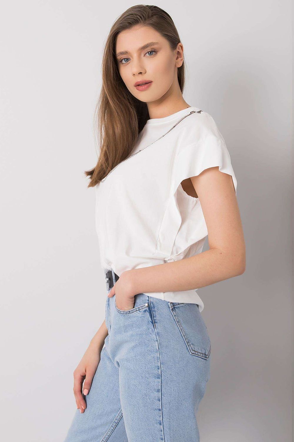 Side profile of the Rue Paris Luxurious Loose Fit Blouse in white, illustrating its chic, loose fit and the elegant detachable chain detail for a contemporary touch.
