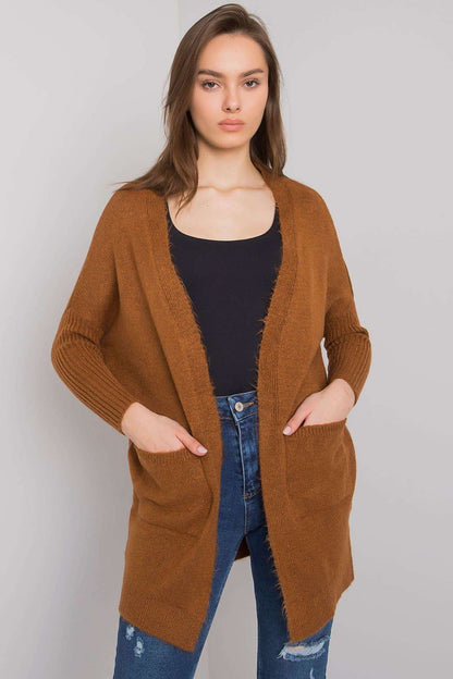 Elegant Long-Sleeved Rue Paris Cardigan with Slip Pockets – Chic Layering Essential in Acrylic Blend, styled with casual high-waisted jeans, showcasing a luxurious caramel hue.