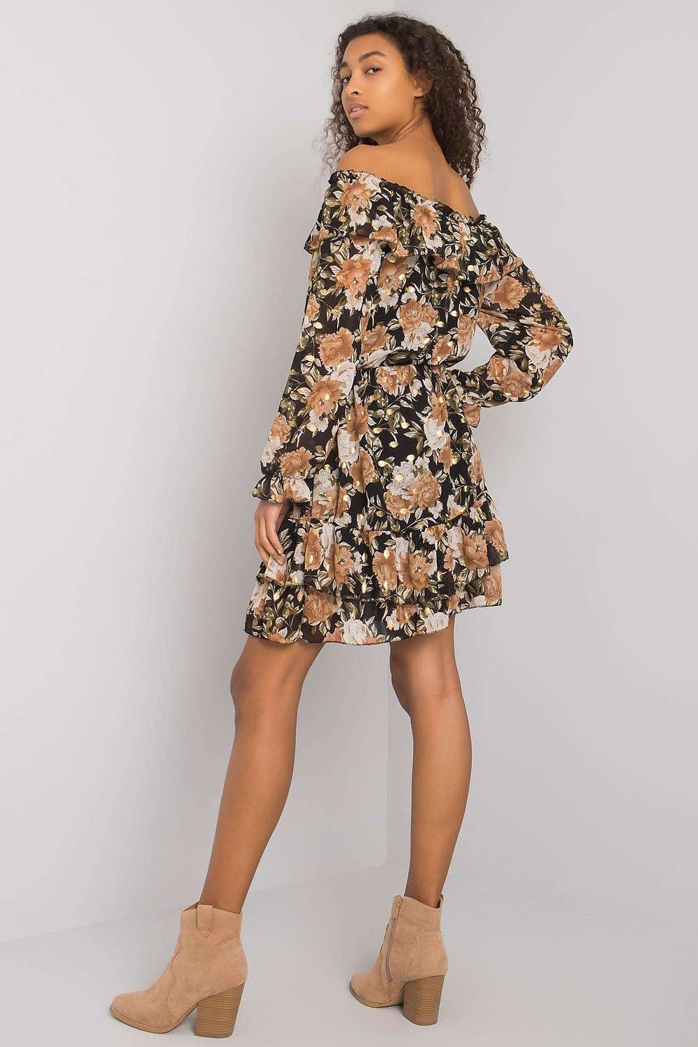 Back view of the Elegant Long Sleeve Dress with Frill Hem and Spanish Neckline by Italy Moda, highlighting the elegant frill hem and stylish floral details on the model.