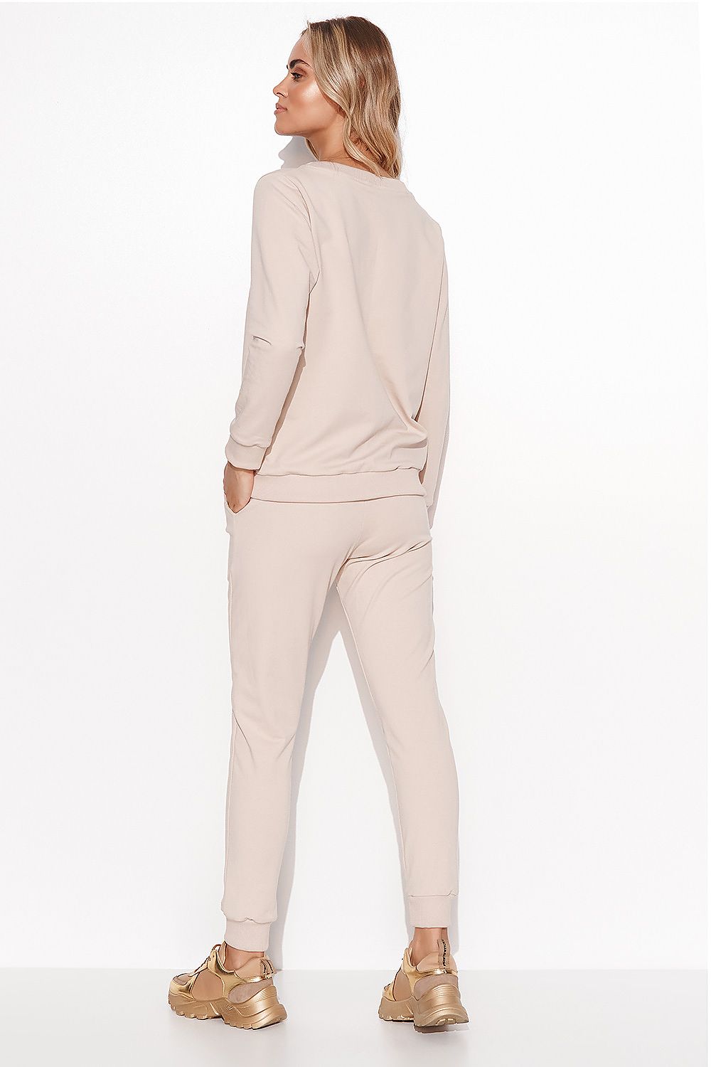 Elegant Women's Makadamia Sweatshirt Set with Crystal Detail and Comfortable Long Pants, stylish beige outfit showcasing the back view of the sweatshirt and pants.